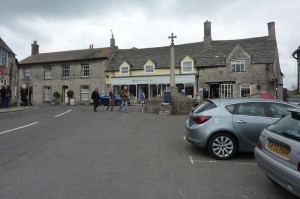 The centre of Corfe Castle Village. In this view, East Street (leading to the car park) is on the left.